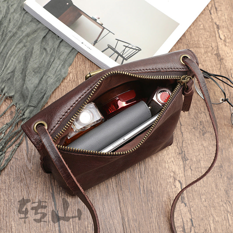 Mini vegetable tanned leather pouch