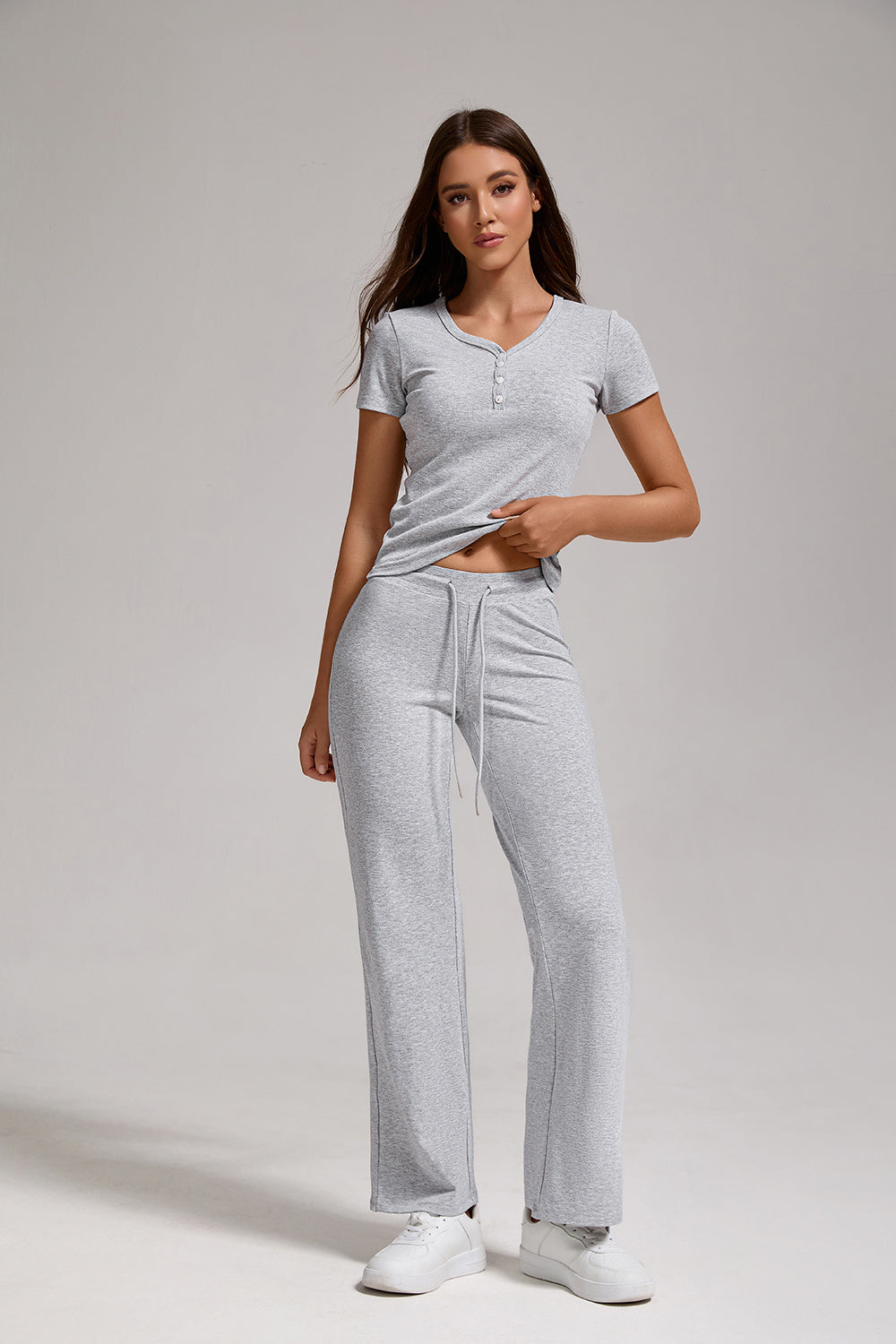 Women's Casual Sports Two-piece Set With V-neck Button, Short Sleeved, Low Waisted Flared Pants, Sportswear